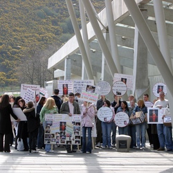 People protesting outside the Parliament